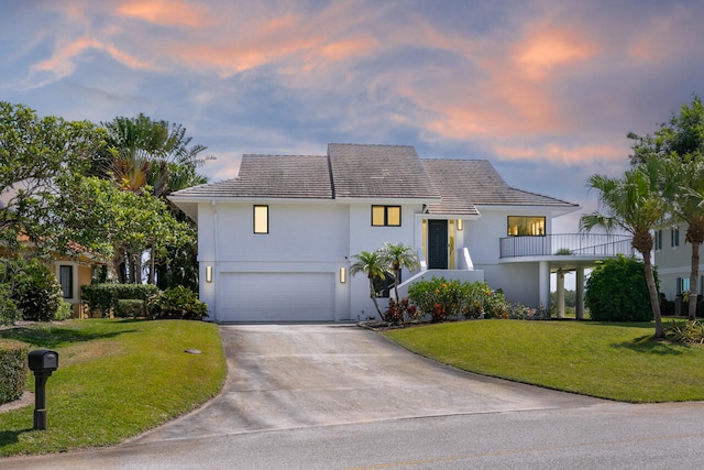 view of front of house with a yard