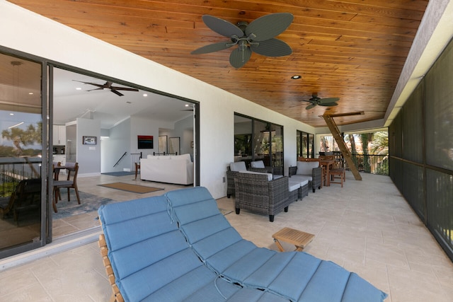 view of patio / terrace with ceiling fan and an outdoor hangout area