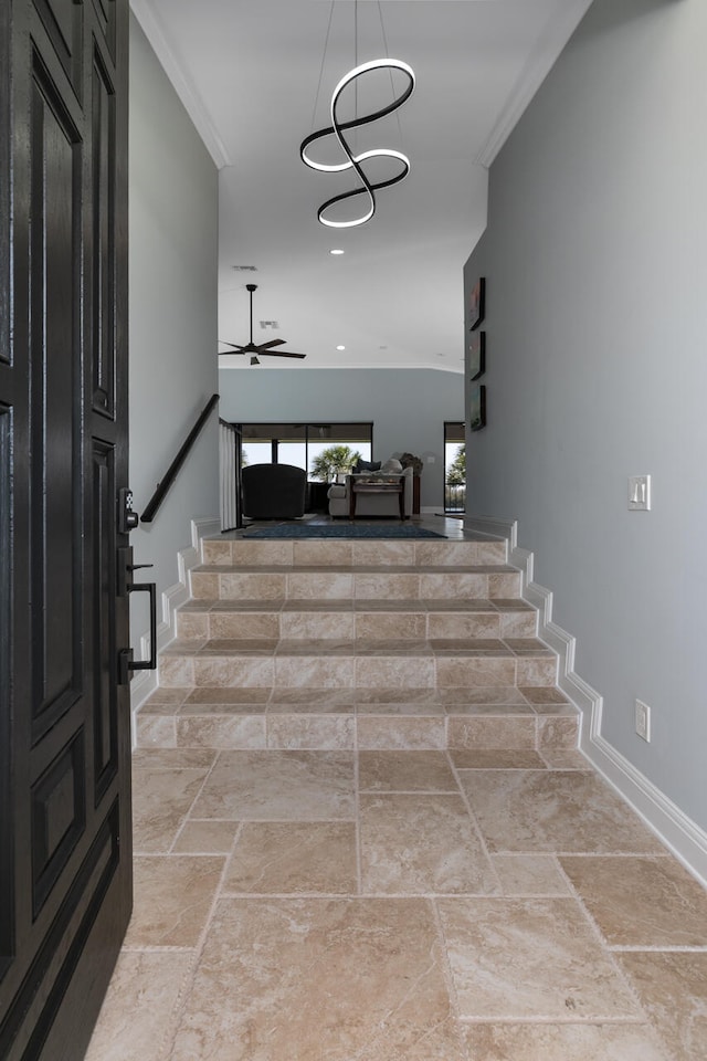 interior space featuring crown molding, light tile floors, and an inviting chandelier