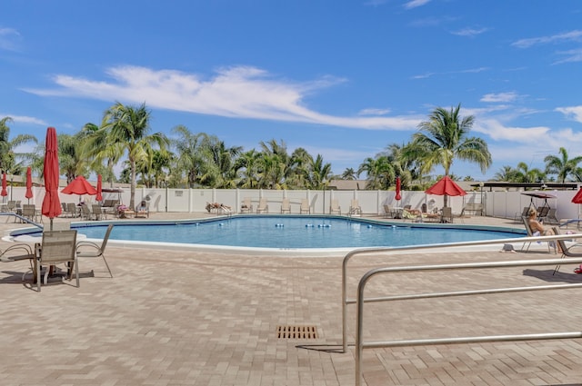 view of swimming pool featuring a patio