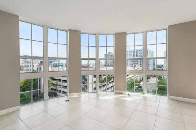 empty room featuring light tile patterned floors