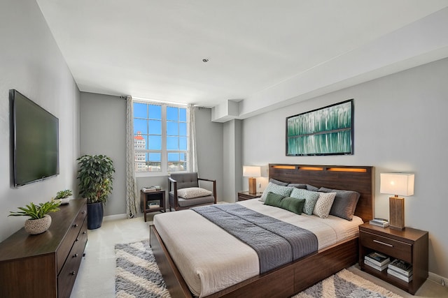 bedroom with light colored carpet