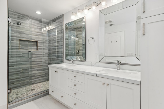 bathroom featuring vanity and walk in shower