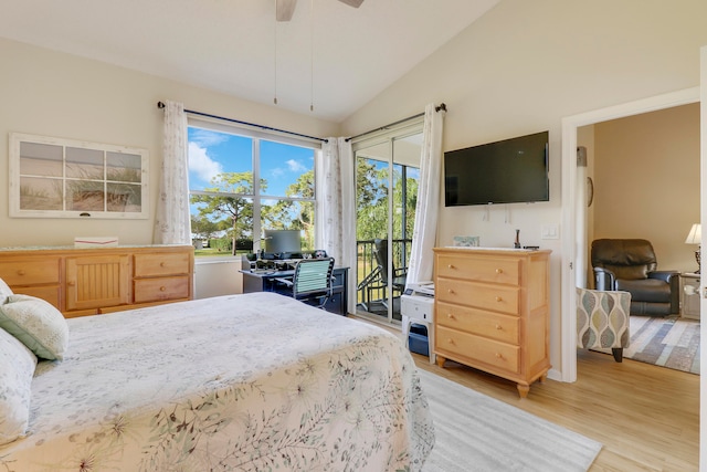 bedroom featuring lofted ceiling, light hardwood / wood-style floors, ceiling fan, and access to exterior