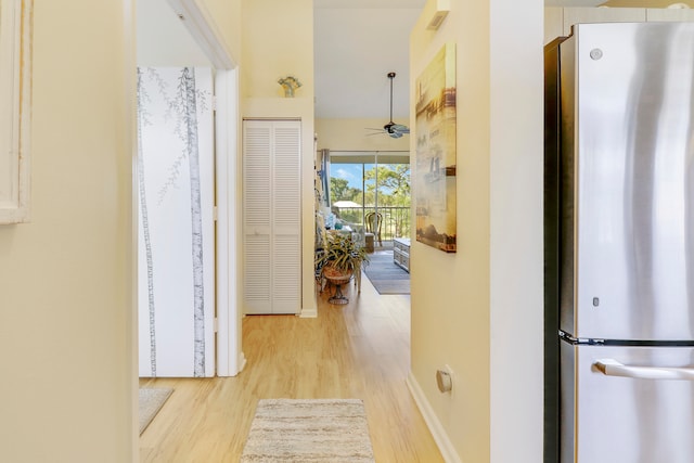 hall with light hardwood / wood-style floors