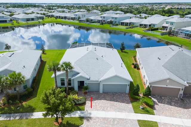 bird's eye view with a water view