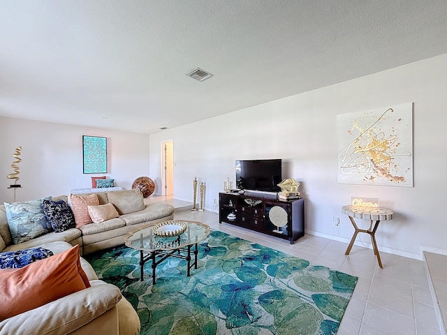 living room with light tile patterned floors