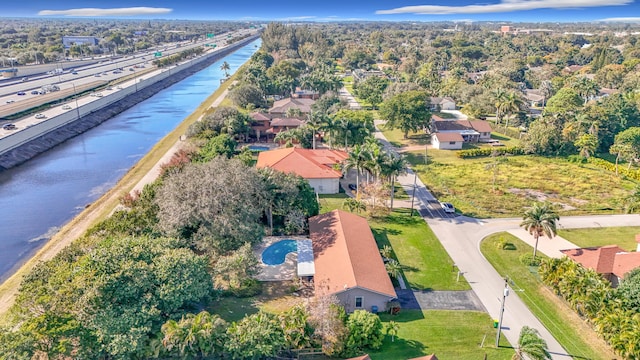 bird's eye view with a water view