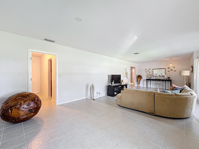 living room featuring light tile patterned flooring