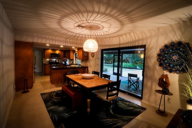 dining room featuring a notable chandelier