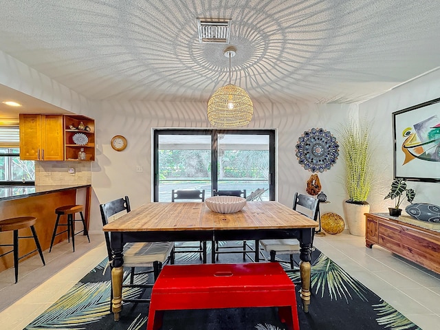 view of tiled dining space