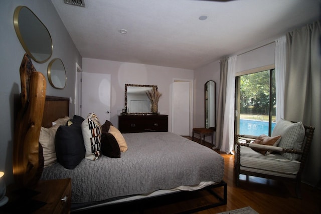 bedroom featuring hardwood / wood-style floors