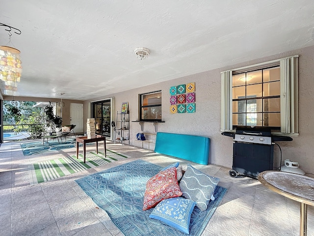 living room featuring a textured ceiling