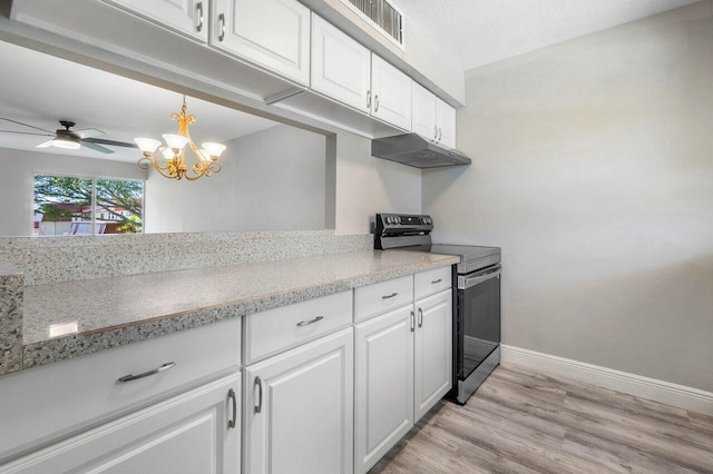 kitchen with white cabinets, electric range oven, light hardwood / wood-style flooring, and ceiling fan with notable chandelier