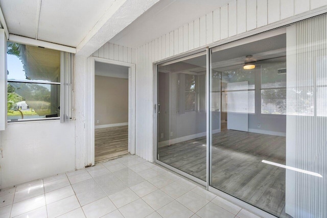 interior space featuring light tile floors