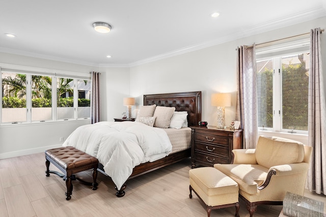 bedroom featuring ornamental molding and multiple windows