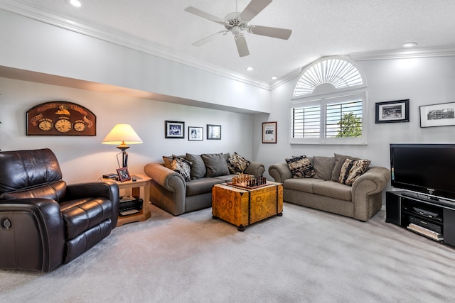 carpeted living room with ornamental molding, lofted ceiling, ceiling fan, and a textured ceiling