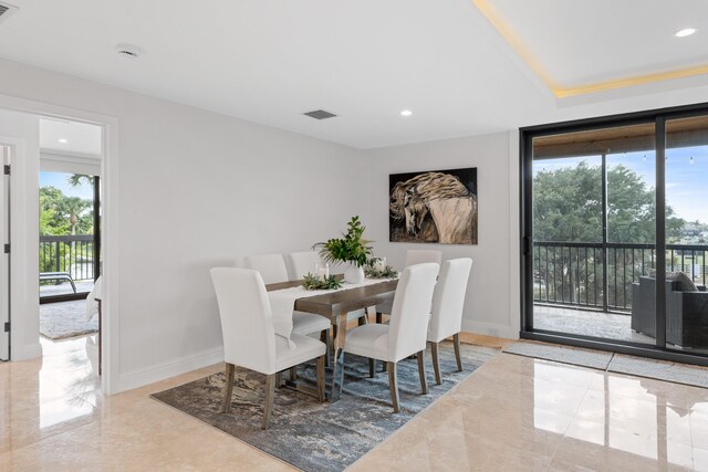 bedroom featuring multiple windows and access to exterior