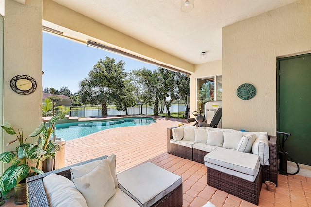 view of pool with an outdoor hangout area and a patio area