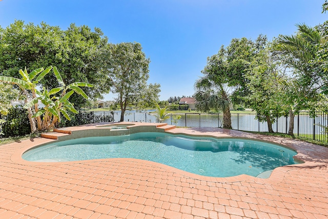 view of pool with an in ground hot tub and a patio