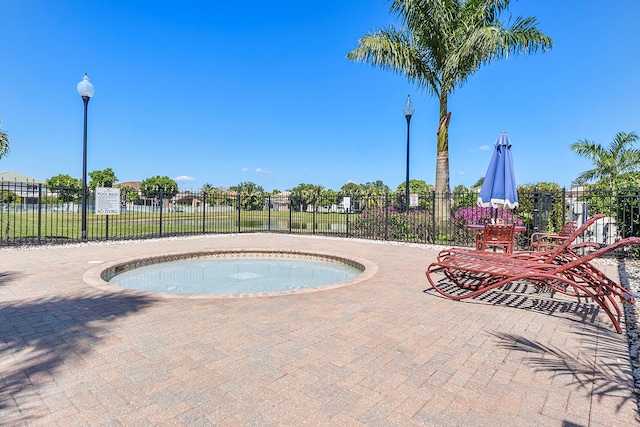 view of pool featuring a patio