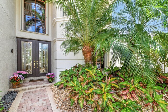 property entrance featuring french doors