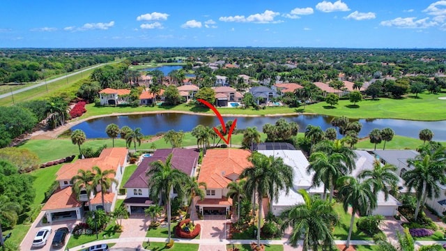 aerial view with a residential view and a water view