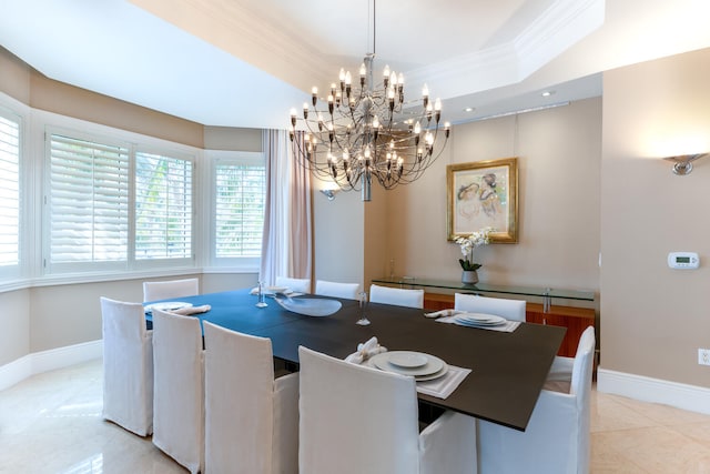 dining space featuring crown molding, a raised ceiling, light tile floors, and a notable chandelier