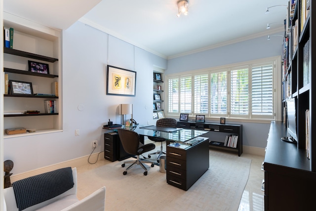 carpeted home office with built in features and ornamental molding