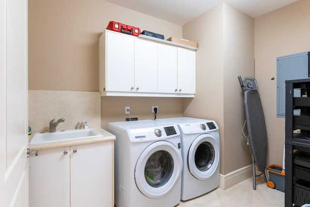 laundry room featuring hookup for an electric dryer, washing machine and dryer, cabinets, sink, and light tile floors