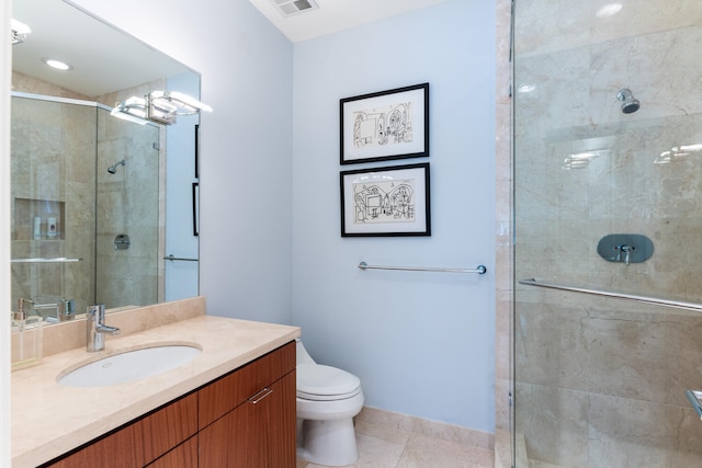 bathroom featuring oversized vanity, an enclosed shower, and toilet