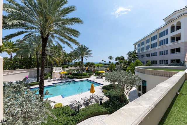 view of swimming pool with a patio