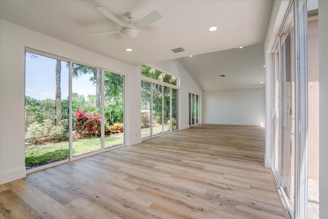 unfurnished room featuring vaulted ceiling, ceiling fan, and light wood-type flooring