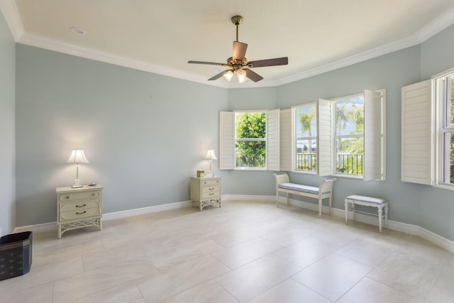 unfurnished room featuring ceiling fan, ornamental molding, and light tile patterned floors