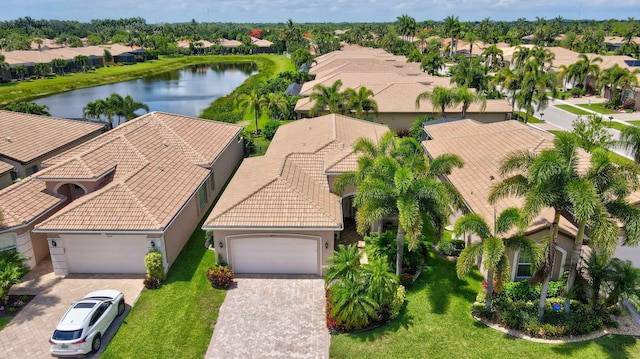 bird's eye view with a water view