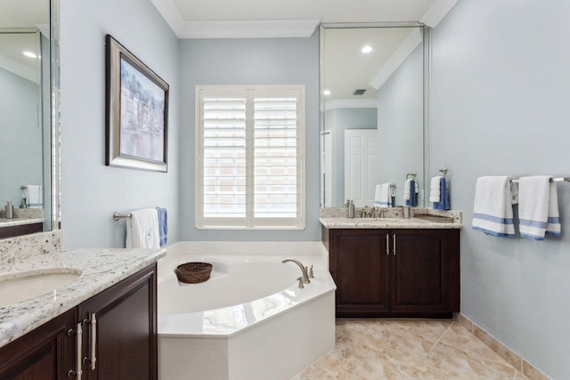 bathroom with a bathing tub, crown molding, tile patterned flooring, and vanity