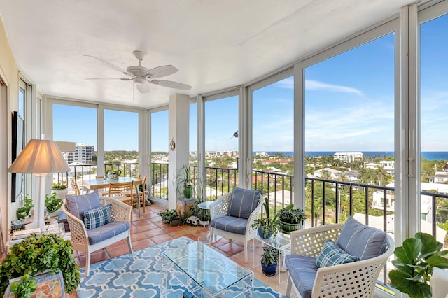 sunroom with ceiling fan