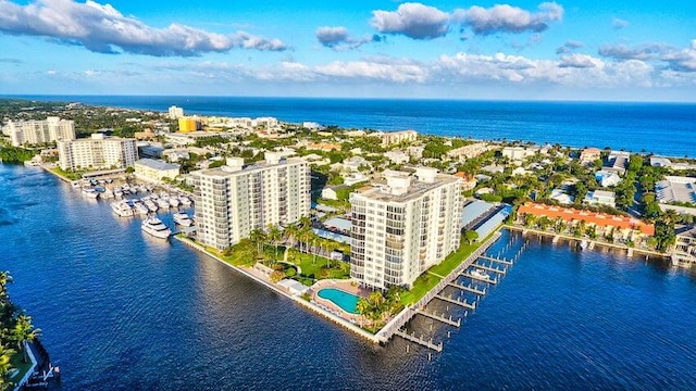 birds eye view of property featuring a water view