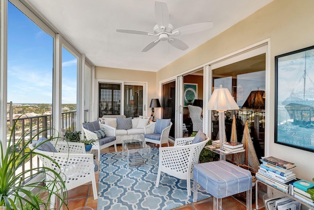 sunroom / solarium with ceiling fan