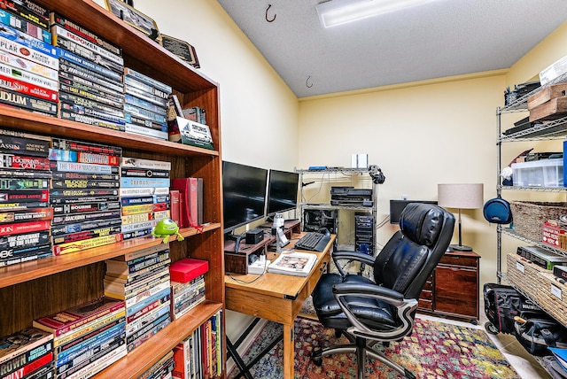 home office featuring a textured ceiling