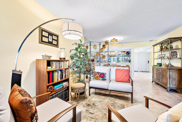 living room with tile floors and a textured ceiling