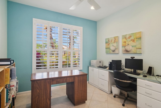 tiled office space with ceiling fan