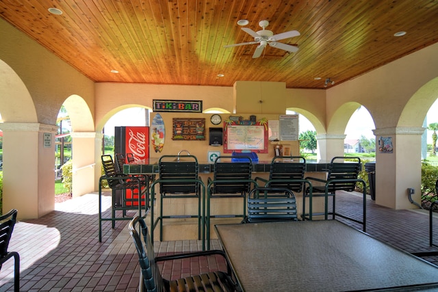 view of terrace featuring ceiling fan