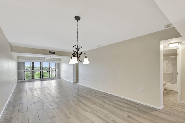 spare room with ceiling fan with notable chandelier and light wood-type flooring