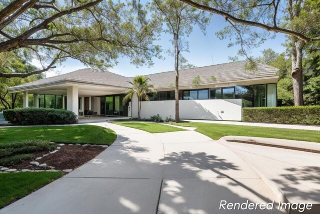 view of front of home with a front yard