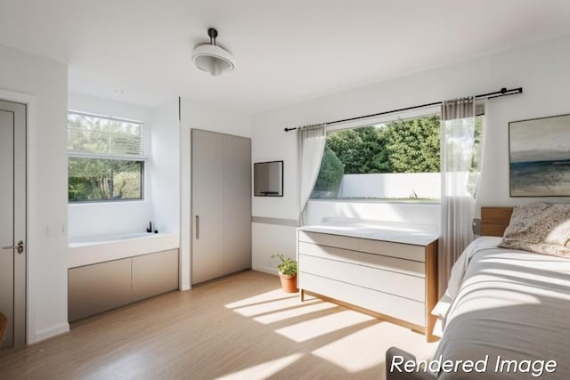 bedroom featuring light hardwood / wood-style floors