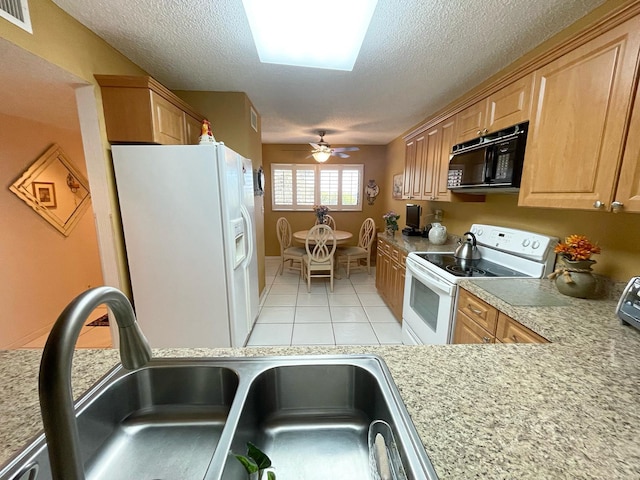 kitchen featuring ceiling fan, white appliances, a textured ceiling, and light tile flooring