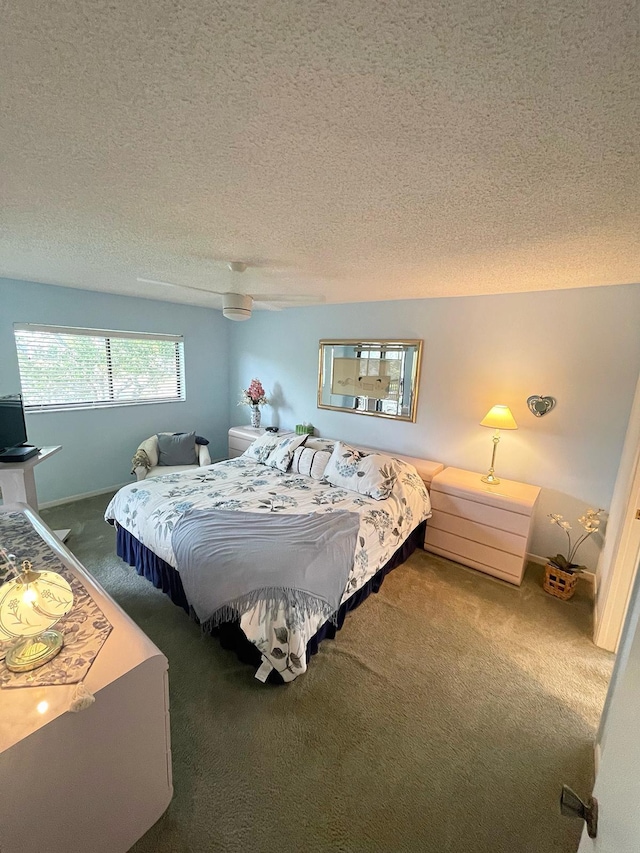 carpeted bedroom featuring a textured ceiling