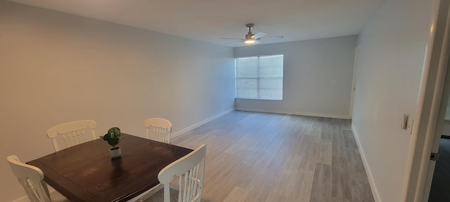 dining room with hardwood / wood-style flooring