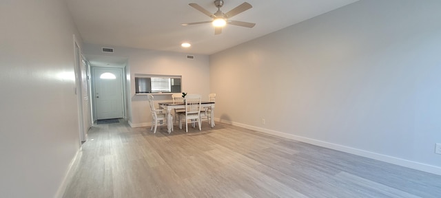 dining space with dark hardwood / wood-style flooring